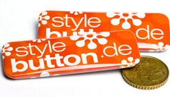 rechteckige Buttons im Größenvergleich zu 50 ct Münze