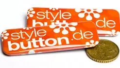 rechteckige Buttons im Größenvergleich zu 50 ct Münze