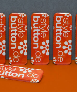 6 Stück bedruckte Buttons: rechteckig 70 x 25 mm