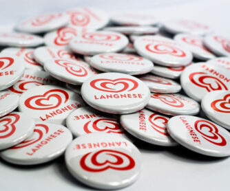 Langnese Buttons Buttons 25 mm mit Bogennadel