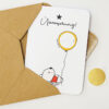 Rubbelkarte mit einem Bär, der einen Luftballon (mit beschreibbarem Rubbelfeld) hält und der Überschrift "Überraschung"